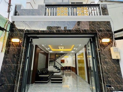 Nhà mới 2 tầng sân thượng nguyễn thị thập  p.bình thuận , q7 0
