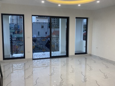 Tòa nhà CHDV  cỗ máy in tiền  tại Tôn Đức Thắng, Đống Đa dt 70m2 x 7 t mt 5,5 m 16 p cho thuê 23,8t 2