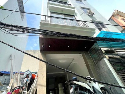 Nhà mới kính coong - mặt ngõ ô tô   trung tâm tây hồ - kinh doanh - thang máy  30/35m2 . 0