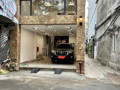 Gấp lô góc, gara oto riêng, trần hữu dực,dt:48m2x5, mt 5m, 12ty 1