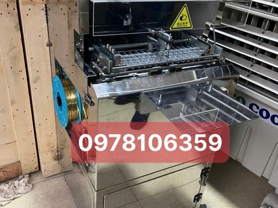 Máy buộc đầu túi bánh sanwich, máy buộc đầu túi bánh mì ngọt, máy buộc túi bánh có xếp hình 1