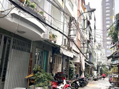 Bán nhà mt đ.số- xe hơi đậu cửa- mt kinh doanh đa ngành nghề- lưu thông vĩnh hội - khánh hội- bến 2