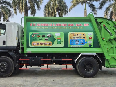 Xe cuốn ép rác 1