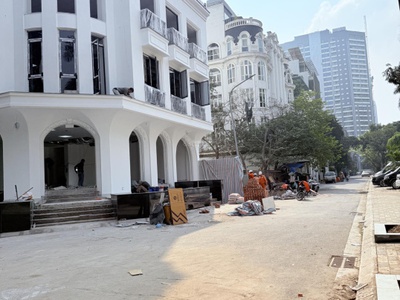 Bán nhà mặt phố phạm văn đồng - 200m mt 10m lô góc vỉa hè nhà mới thang máy kdvp gần kđt starlake 3