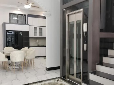 Nhà đẹp phúc lợi  4 tầng thang máy  gara oto  dt 88m - mt 5m  giá chỉ 15,x tỷ 3