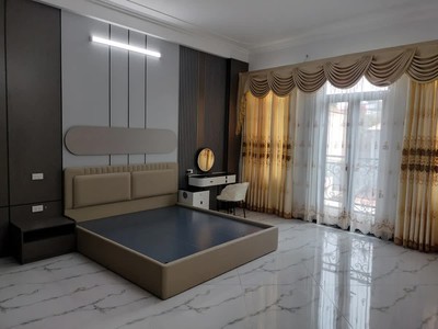 Nhà đẹp phúc lợi  4 tầng thang máy  gara oto  dt 88m - mt 5m  giá chỉ 15,x tỷ 4