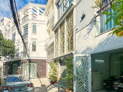 ‼ lê quang định   xe hơi vào nhà   4 tầng nở hậu - lô góc xây mới 0