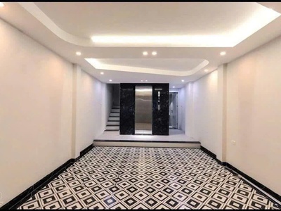 Hoàng quốc việt - lô góc - kinh doanh - ô tô , ngõ thông 7 tầng full nội thất , đầy đủ pccc , thang 0