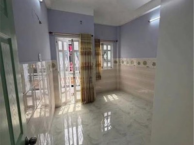 Nhà đường lạc long quân phường 3 quận 11 cũ . cách mặt tiền  50m . 4