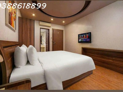 Bán mặt phố trần quốc vượng 131mx8t, mt 10,5m - thang máy - lô góc - dòng tiền 1.8 tỷ/năm 0