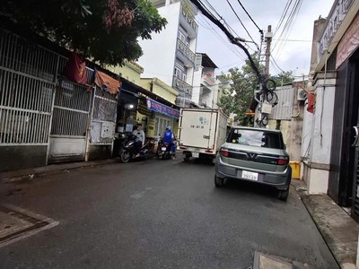 Bán nhà tân sơn nhì  hxh tránh thông  7 tầng thang máy  86m2 ngang 6 14.x 4