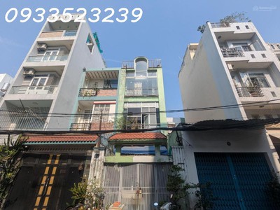 Căn nhà mặt tiền đường 8m kd buôn bán - dt 4m x 23m - 4 tầng - chỉ 9,8 tỷ - gần chợ phạm văn bạch 1