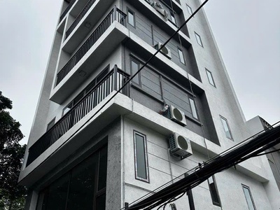 Hiếm  tòa nhà dương khuê, 3thoáng,view hồ, oto tránh dừng đỗ,thang máy,dt:70mx7t,mt: 6.5m, 19.4ty 2