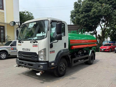 Cần bán xe tưới nước rửa đường howo 0