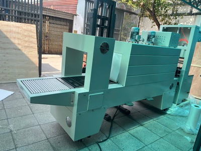 Máy cắt dán và rút màng co PE cho lốc chai lon, máy màng co PE lốc chai nước 0