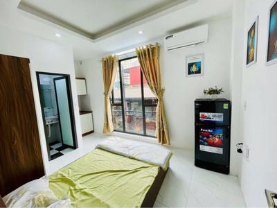 CHDV 6T thang máy phố Trương Định 13 phòng full nội thất gần ô tô ngõ rộng dòng tiền 800 triệu/ năm 2