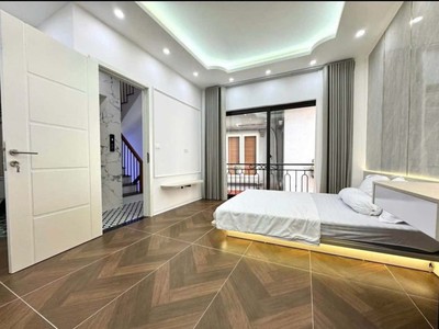 Nhà 6 tầng thang máy gần phố Xã Đàn ô tô đỗ cổng, qua nhà sân rộng 34m2 nội thất hiện đại về ở ngay 2