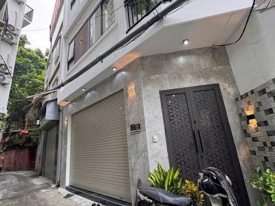 Bán nhà trần quốc hoàn cầu giấy 2 mặt ngõ ô tô 45m2 7 tầng 24 tỷ 0