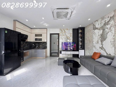 Bán nhà trần quốc hoàn cầu giấy 2 mặt ngõ ô tô 45m2 7 tầng 24 tỷ 2